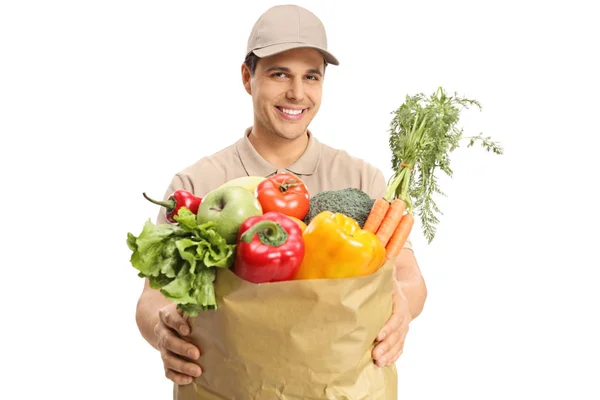 Levering Guy Geven Een Zak Boodschappen Geïsoleerd Witte Achtergrond — Stockfoto