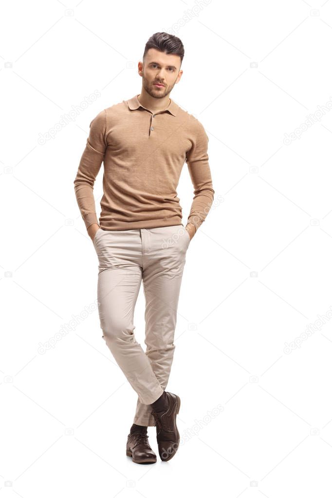 Full length portrait of a young man posing isolated on white background