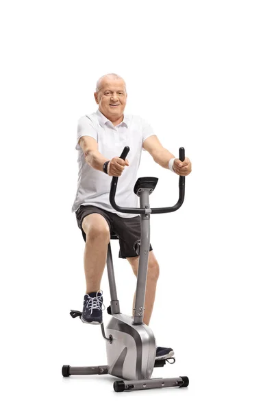 Mature Man Working Out Stationary Bike Isolated White Background — Stock Photo, Image