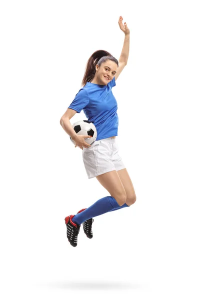 Full Längd Porträtt Kvinnlig Fotbollspelare Hoppning Och Gestikulerande Lycka Isolerad — Stockfoto