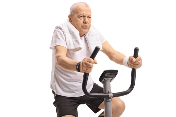 Tired Mature Man Working Out Exercise Bike Isolated White Background — Stock Photo, Image