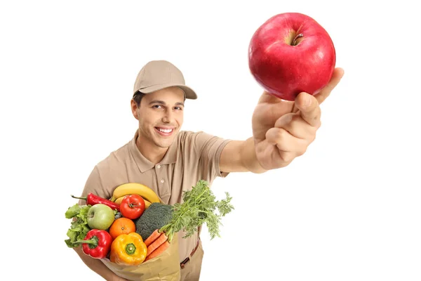 Repartidor Con Una Bolsa Comestibles Una Manzana Aislada Sobre Fondo —  Fotos de Stock