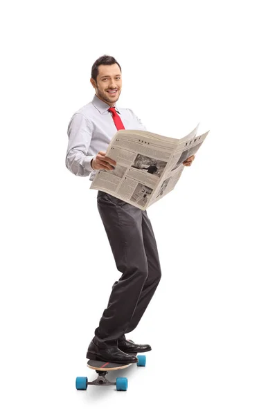 Full Length Portrait Businessman Holding Newspaper Riding Longboard Isolated White — Stock Photo, Image