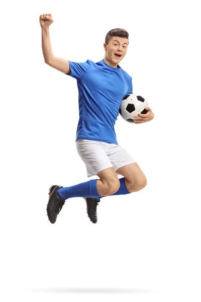 代のサッカー選手の分離の白い背景をジャンプは大喜び — ストック写真