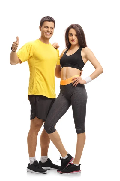 Full Length Portrait Fitness Couple Making Thumb Gesture Isolated White — Stock Photo, Image