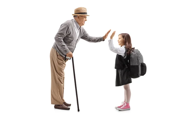 Full Length Profile Shot Mature Man High Fiving Schoolgirl Isolated — Stock Photo, Image