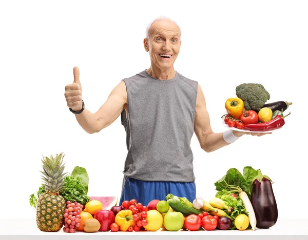 Senior Sportswear Holding Plate Making Thumb Sign Table Fruit Vegetables — Stock Photo, Image