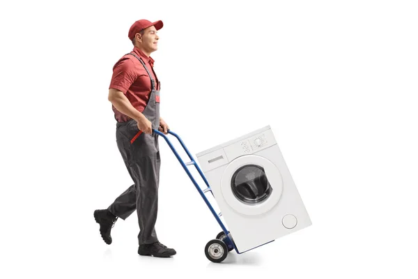 Full Length Profile Shot Mover Pushing Hand Truck Loaded Washing — Stock Photo, Image