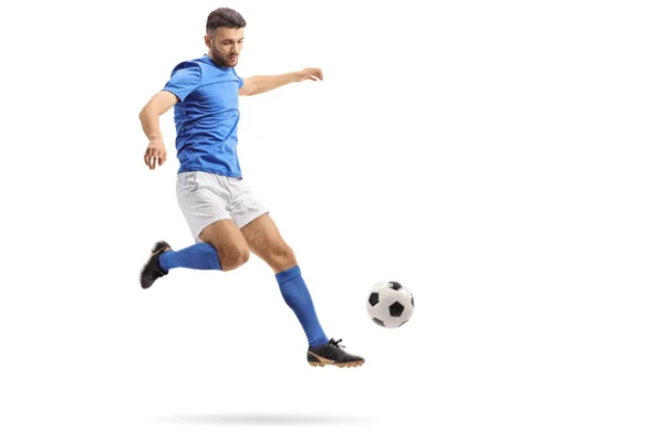 Full Length Portrait Soccer Player Mid Air Kicking Football Isolated — Stock Photo, Image