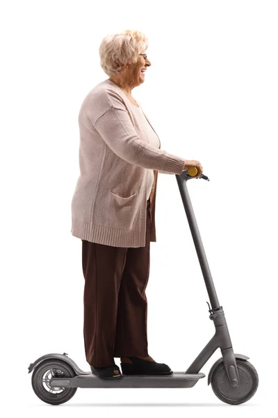 Senior vrouw op een elektrische scooter — Stockfoto
