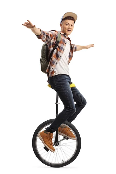 Animado masculino estudante equitação um unicycle — Fotografia de Stock