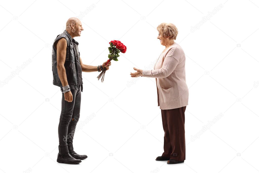 Punk giving a bouquet of roses to an elderly woman