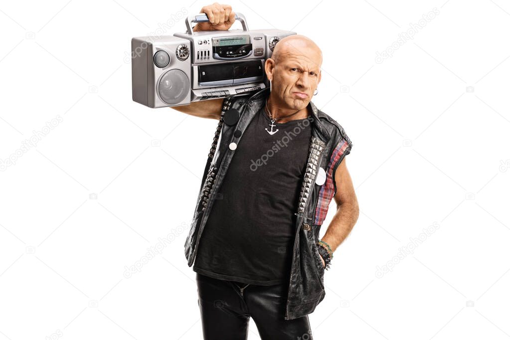 Grumpy punker carrying a boombox radio on his shoulder 