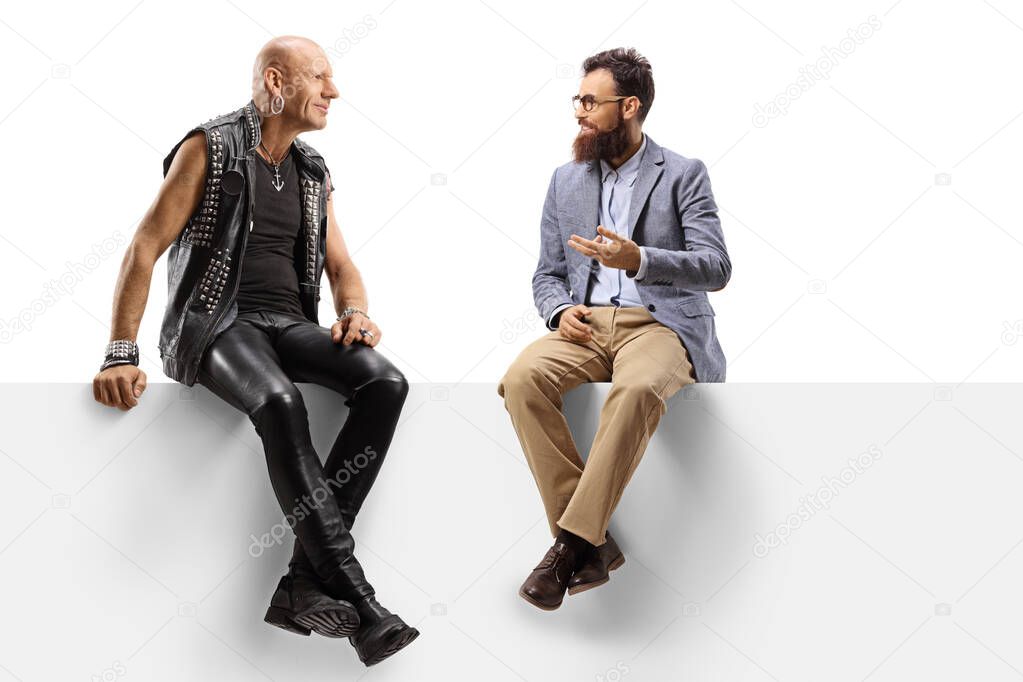 Bearded man and a punker on a panel having a conversation