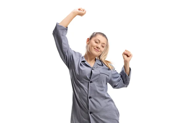 Woman in pajamas stretching in the morning — Stock Photo, Image