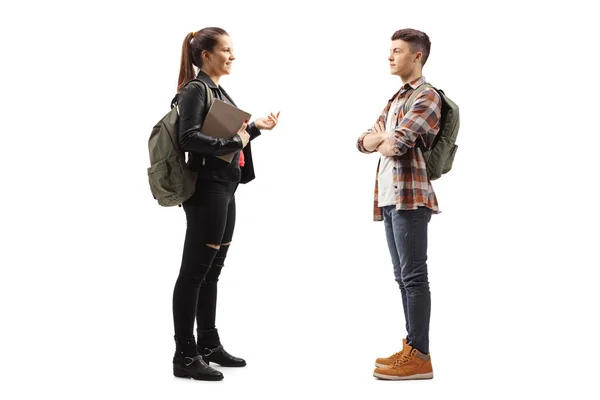 Female student talking to a male student — Stockfoto