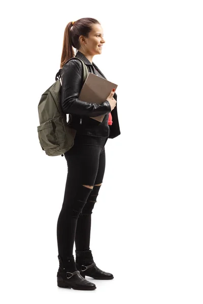 Vrouwelijke student holding een boek en glimlachen — Stockfoto