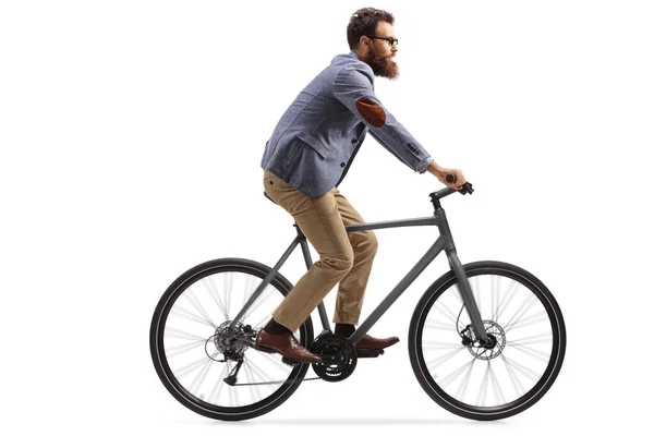 Hombre barbudo con ropa formal montando en bicicleta — Foto de Stock