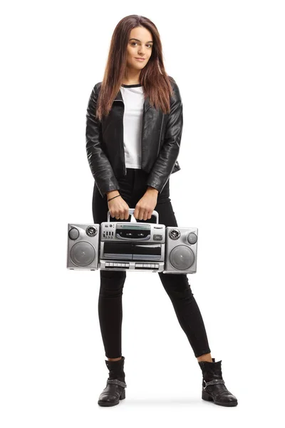 Young female with a boombox standing and looking at the camera — Stock Photo, Image