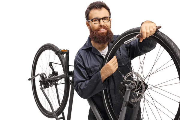 Repairman fixing a bicycle — Stock Photo, Image