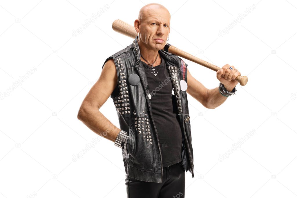 Serious punker holding a bat on shoulder