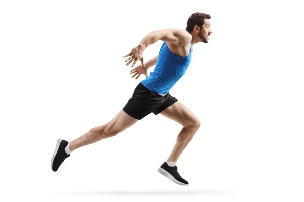 Strong muscular man running fast — Stock Photo, Image