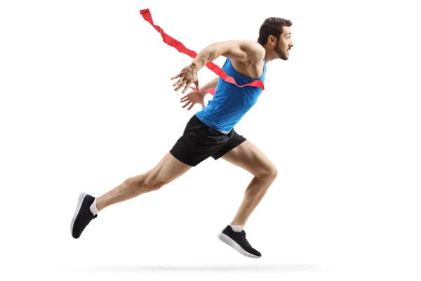 Fit man finishing a race — Stock Photo, Image