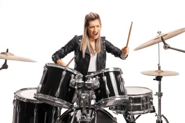 Female drummer playing on a set of drums clipart