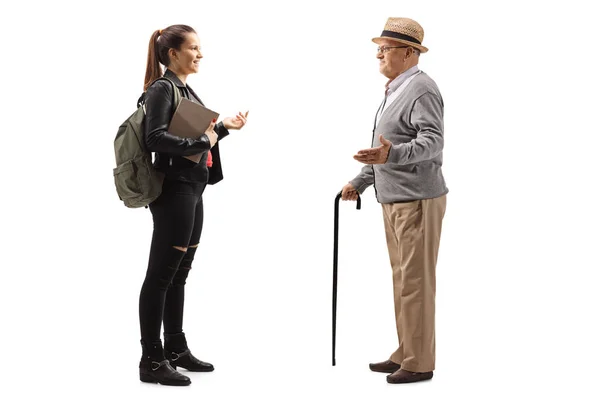 Nonno che parla con una nipote adolescente — Foto Stock