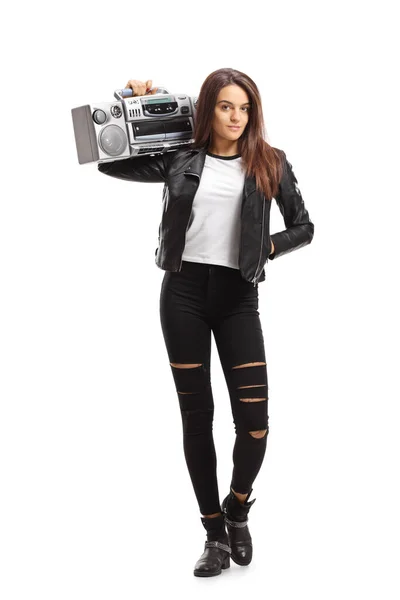 Young woman holding a boombox on her shoulder — Stock Photo, Image
