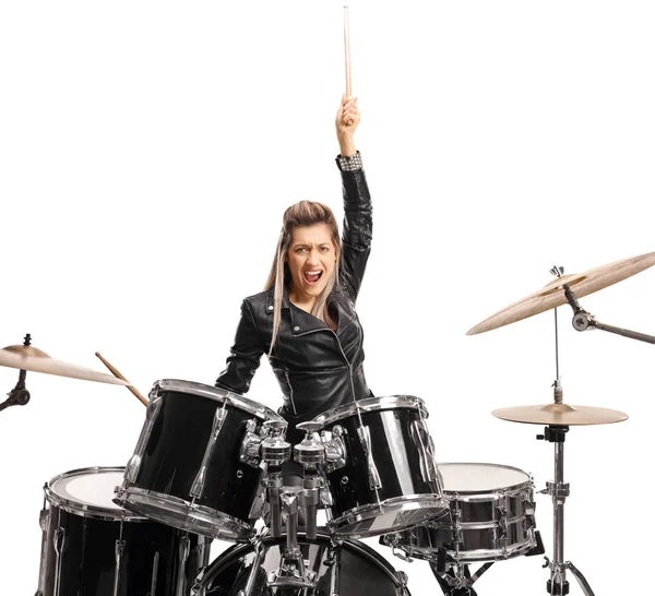 Возбужденная женщина-барабанщица поднимает барабанную палочку — стоковое фото
