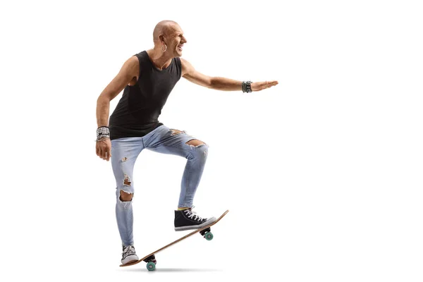 Plešatý hipster muž na skateboardu — Stock fotografie