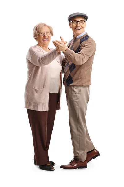 Пожилые мужчины и женщины танцуют танго — стоковое фото