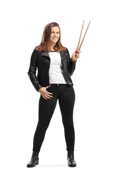 Young female holding drumsticks — Stock Photo, Image