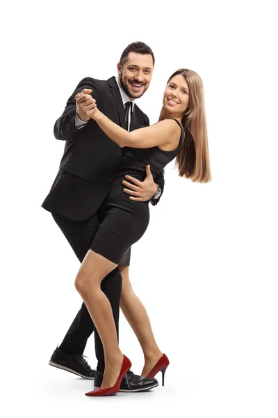 Joven pareja elegante bailando tango — Foto de Stock