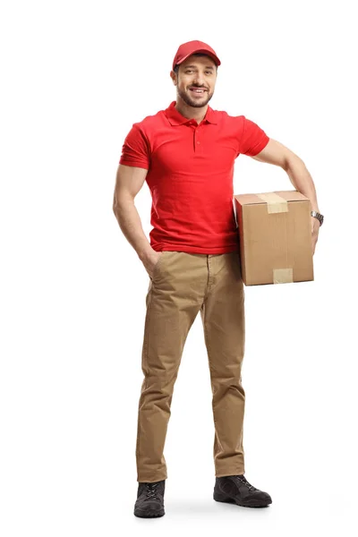 Delivery guy holding a cardboard box — Stock Photo, Image