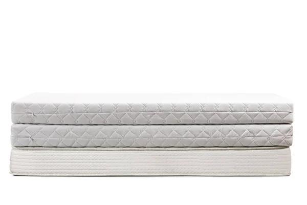 Studio shot of three bed mattresses on top of each other — Stock Photo, Image