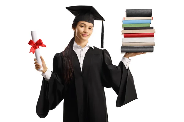 Студентка-випускниця в сукні з купою книг і зануренням — стокове фото