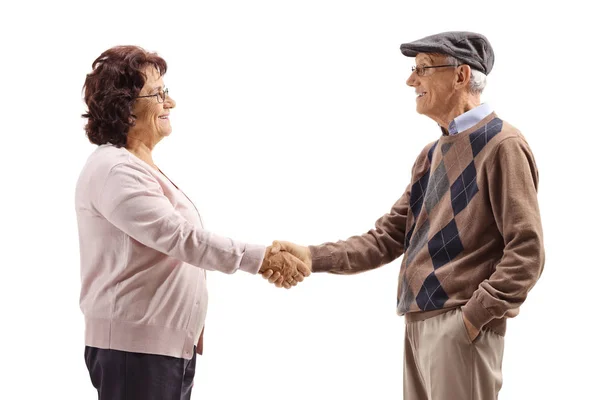 Ancianos hombre y mujer estrechando las manos —  Fotos de Stock