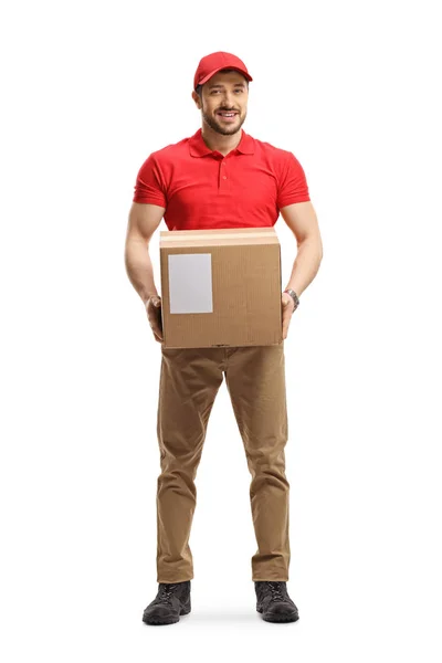 Homem de entrega segurando uma caixa de papelão — Fotografia de Stock