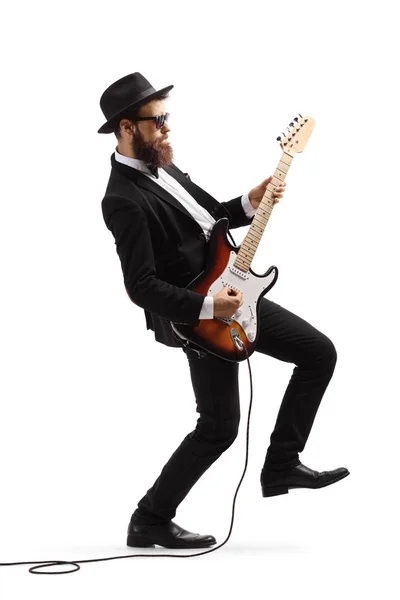 Manliga musiker spelar en elgitarr — Stockfoto