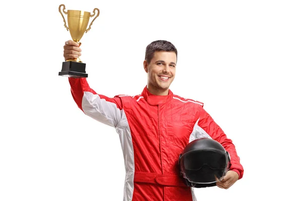 Jeune coureur de voiture mâle debout et tenant un casque et un or tr — Photo