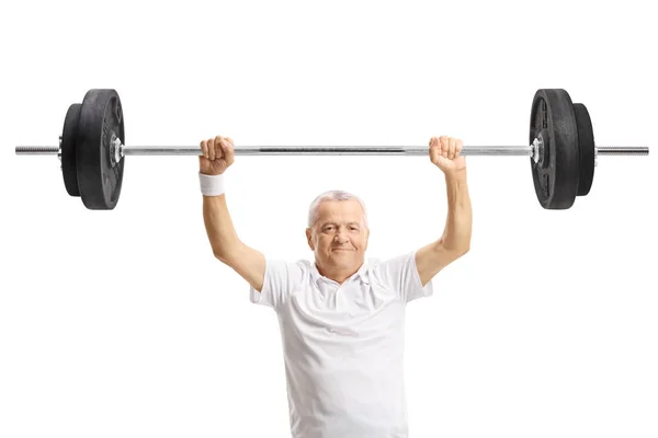 Mature man lifting weights — Stock Photo, Image
