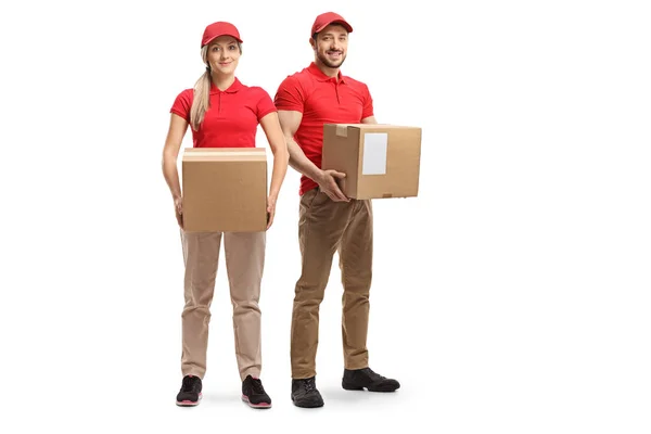 Equipe de entrega de um homem e mulher segurando pacotes — Fotografia de Stock