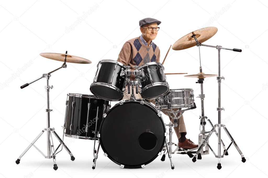 Elderly man playing drums
