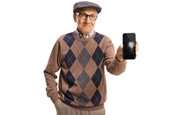 Trieste senior man met een telefoon met een gebroken scherm — Stockfoto