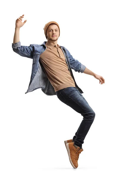 Young guy dancing on tiptoes — Stock Photo, Image