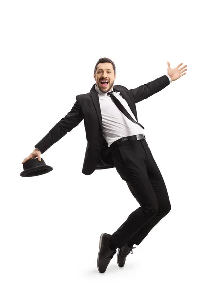 Een man in een pak die danst en zingt — Stockfoto