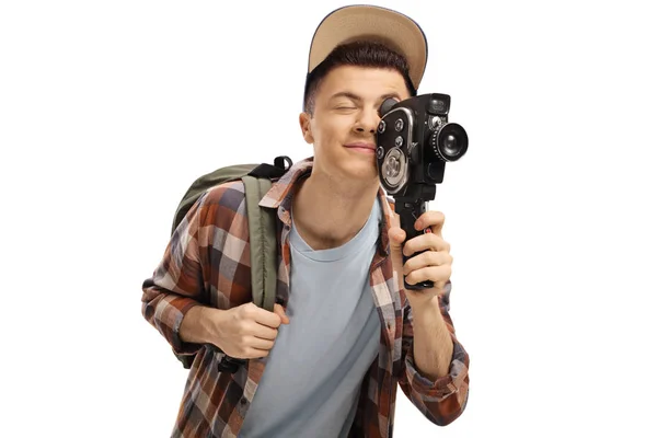 Estudiante masculino grabando con una cámara vintage de 8 mm —  Fotos de Stock