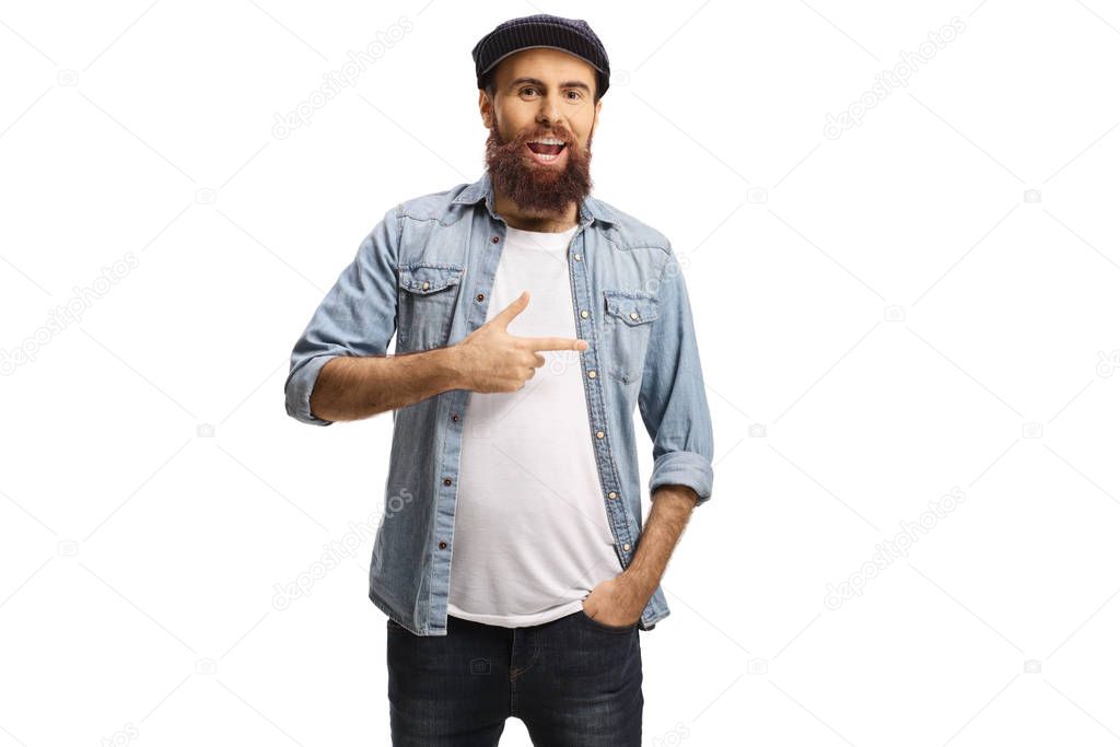 Bearded casual man laughing and pointing to something 